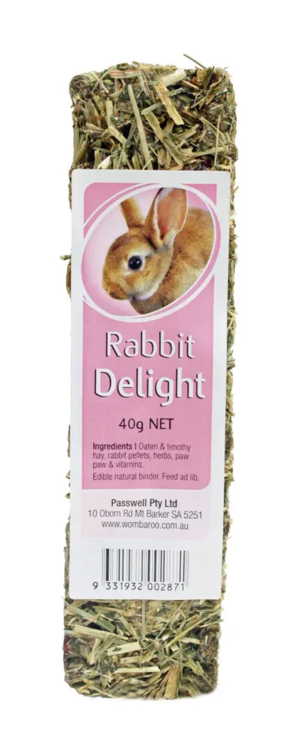 A rabbit is sitting in front of the label.