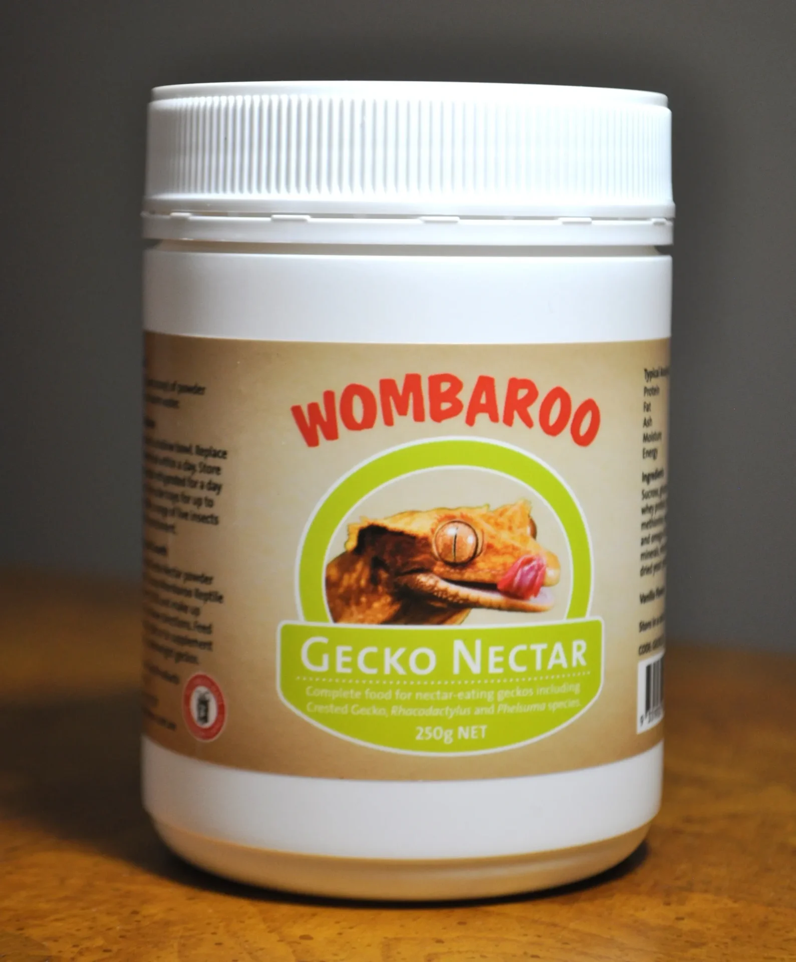 A jar of wombaroo gecko nectar on top of a table.