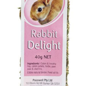 A rabbit is sitting in front of the label.